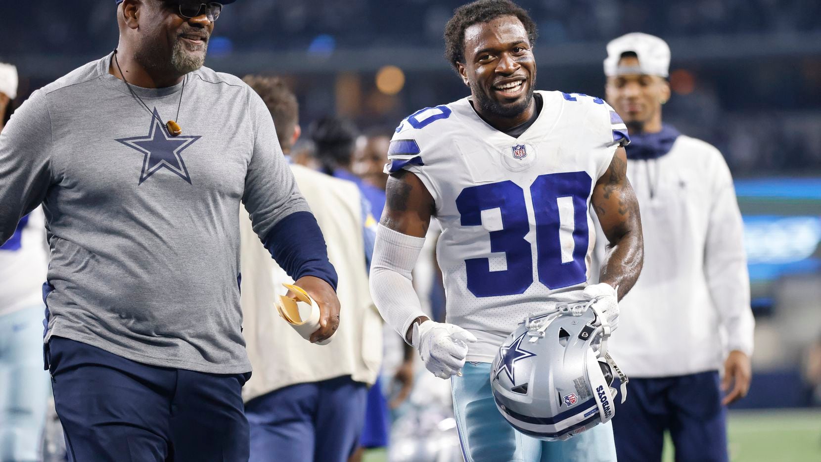 Dallas Cowboys cornerback Anthony Brown (30) is all smiles after his pick-six against the...