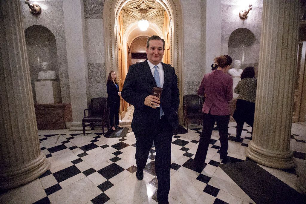Sen. Ted Cruz, R-Texas, departs the Senate chamber on Capitol Hill in Washington, Friday,...
