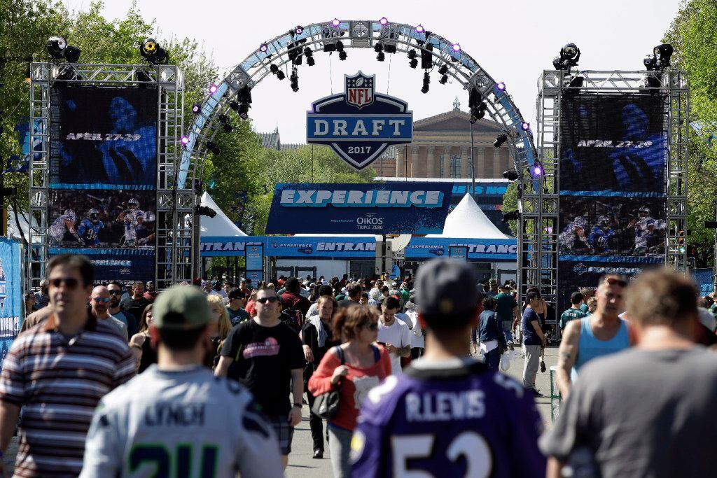Fans gather before the second round of the 2017 NFL football draft, Friday, April 28, 2017,...
