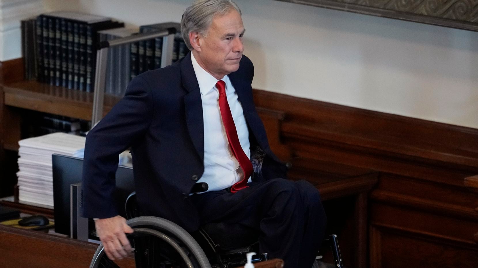 Texas Gov. Greg Abbott arrives for a Memorial Day Ceremony in the House Chamber at the Texas...