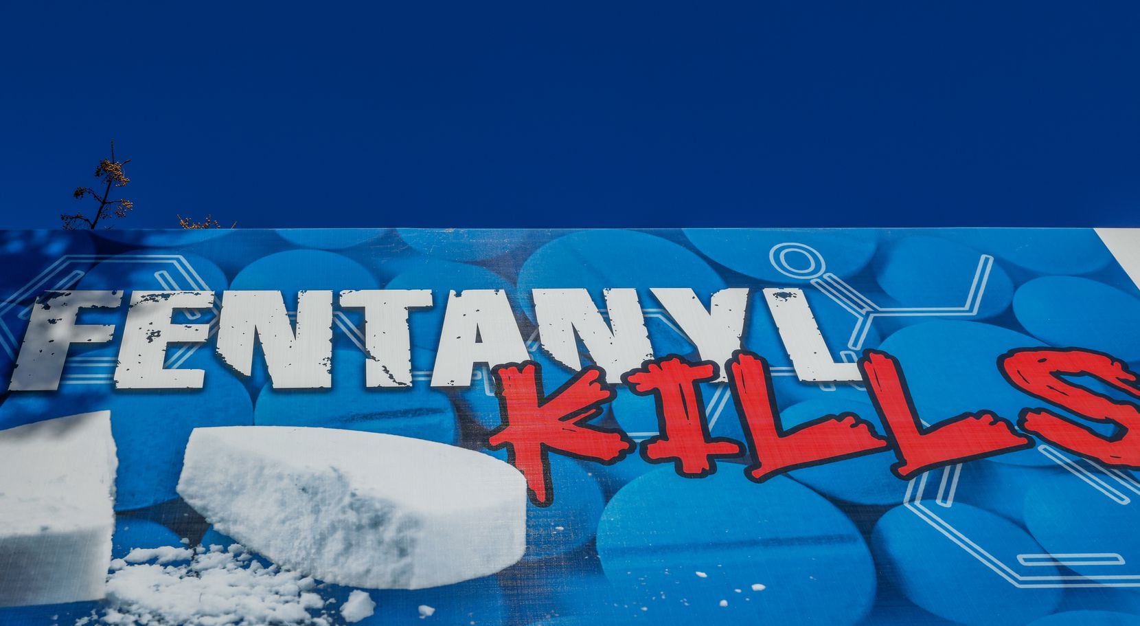 A billboard on the west side of downtown Dallas warns against the dangers of fentanyl as...