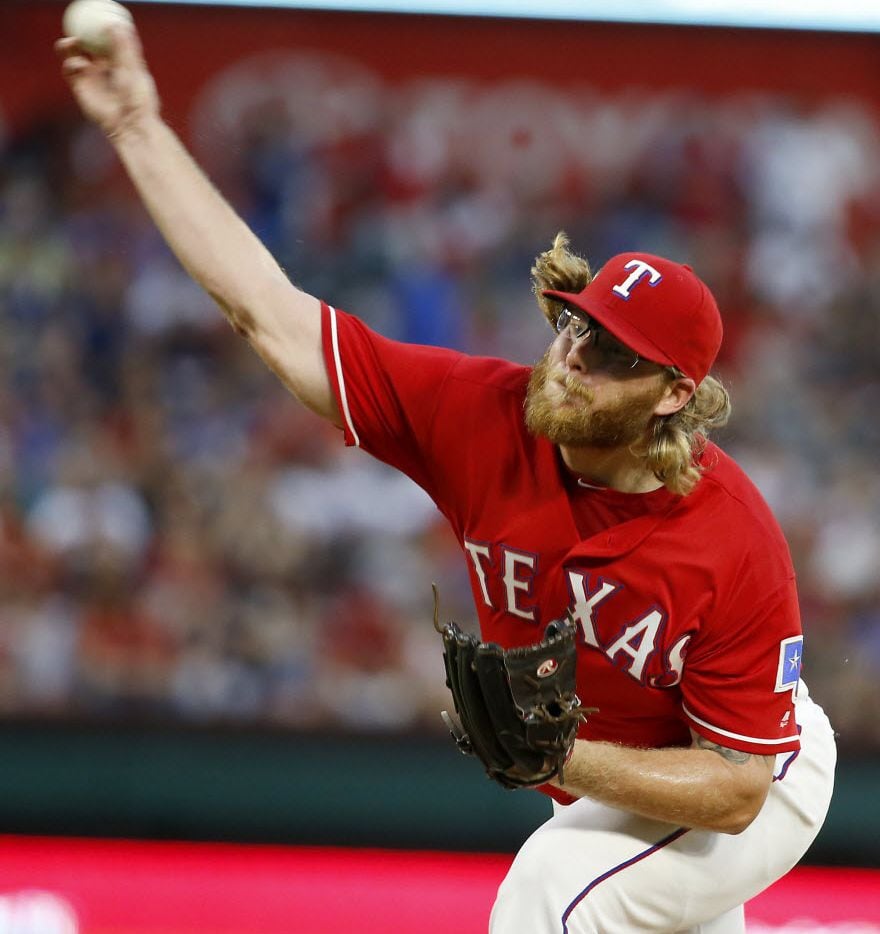 Texas Rangers starting pitcher A.J. Griffin (64) throws a pitch against Boston Red Sox...
