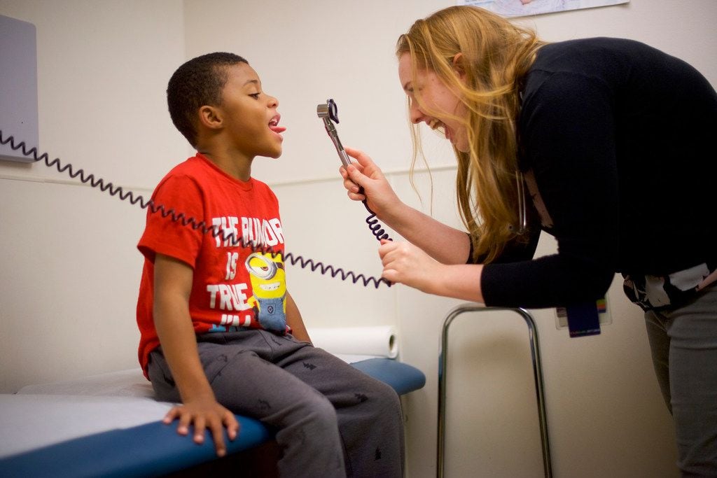Alexander Gardner, 7, who has coverage through the Children's Health Insurance Program, gets a checkup at a clinic run by the Nemours Children's Health System in Wilmington, Del.