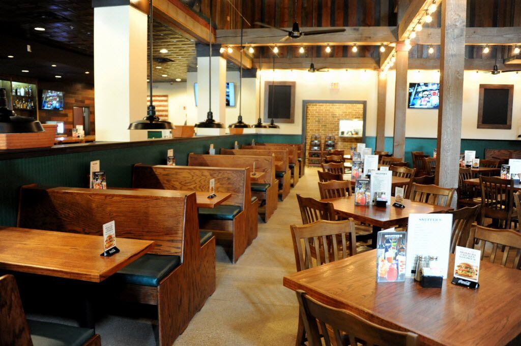Booths from an old Snuffers location have a new home at Snuffers in Addison, TX on May 7,...