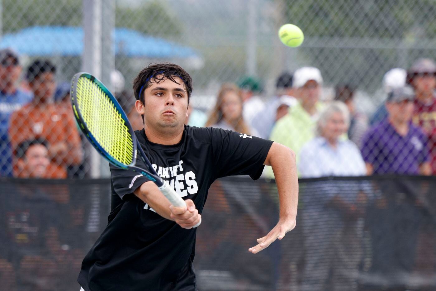 Plano West’s Kishan Kersten lines up his shot during the 6A boys doubles championship match...