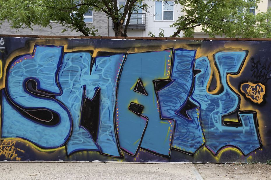This mural in Trinity Groves' Art Park and beer garden was created by a 12-year-old boy who goes by the name Smaly.