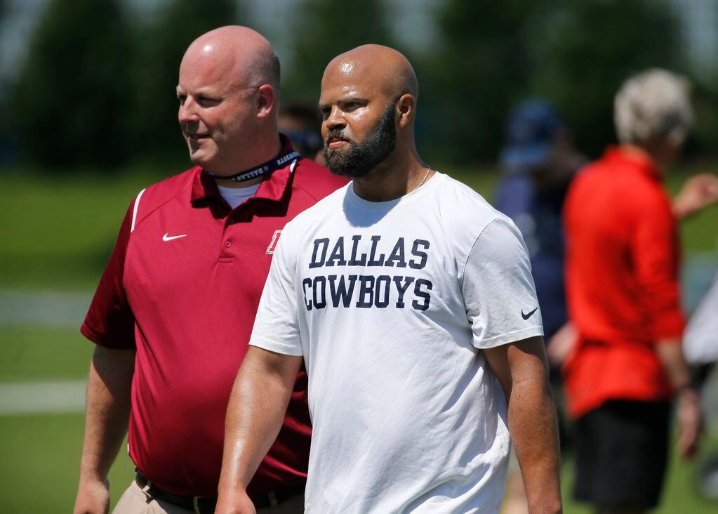 Kris Richard (center), new secondary coach during the Dallas Cowboys rookie minicamp at the...