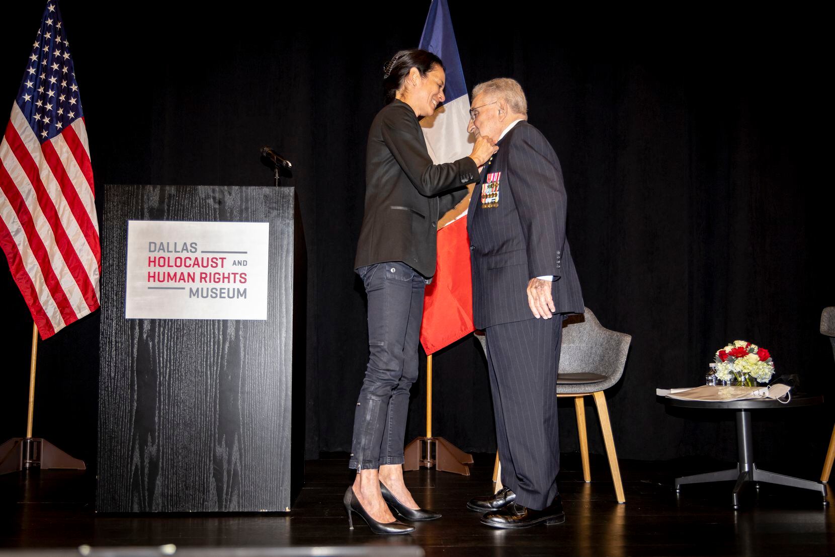 Consul General Valérie Baraban bestows France’s Legion of Honor medal on Ralph Hockley, who...