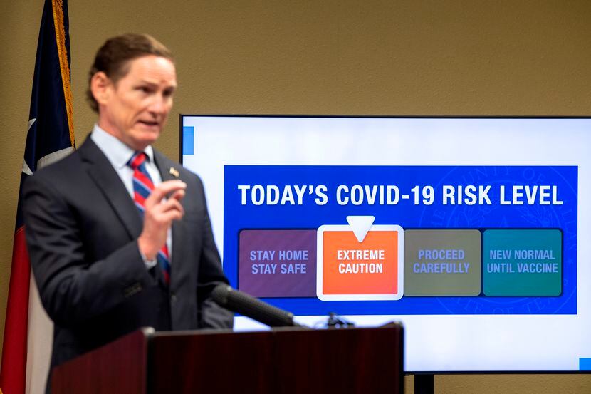 Dallas County Judge Clay Jenkins announced a shift from red to orange in the COVID-19 risk...