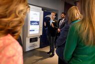 Comerica’s Austen Merconti showed how the company tech locker works for those on a tour of...