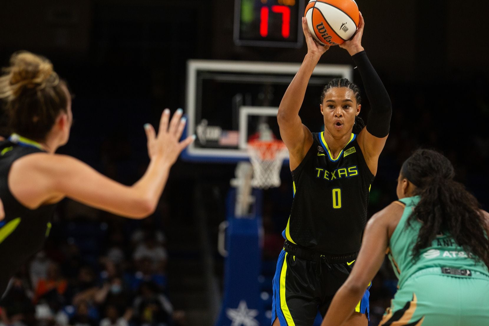 Dallas Wings forward Satou Sabally looks for a pass during their game against New York...