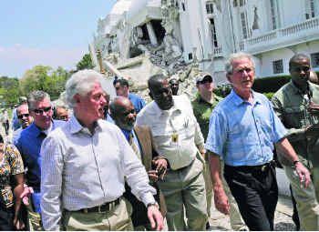 Former presidents Bill Clinton and George W. Bush visit to the earthquake-damaged...