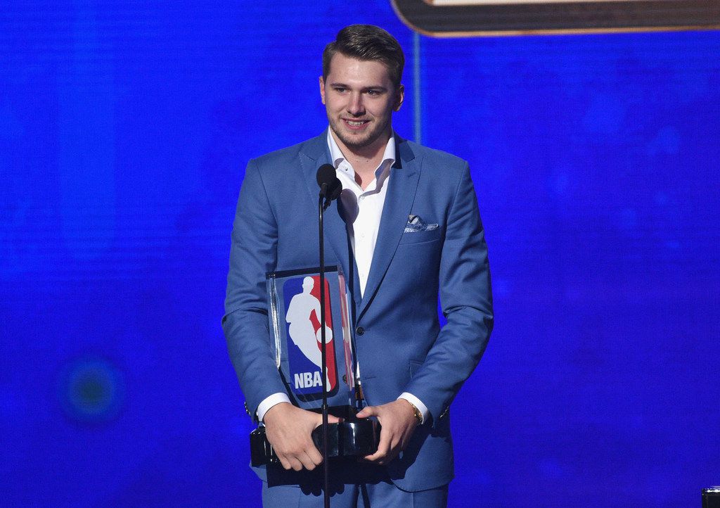 Luka Doncic, of the Dallas Mavericks, accepts the NBA rookie of the year award at the NBA...
