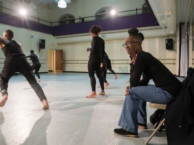 Choreographer Michelle N. Gibson watches as Dallas Black Dance Theatre rehearses her...