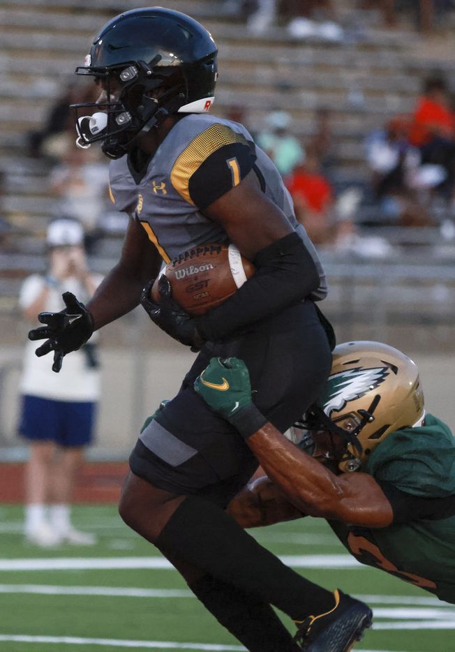 St. Frances Academy Ryan Manning (1) runs into the end zone to score a touchdown as  DeSoto...