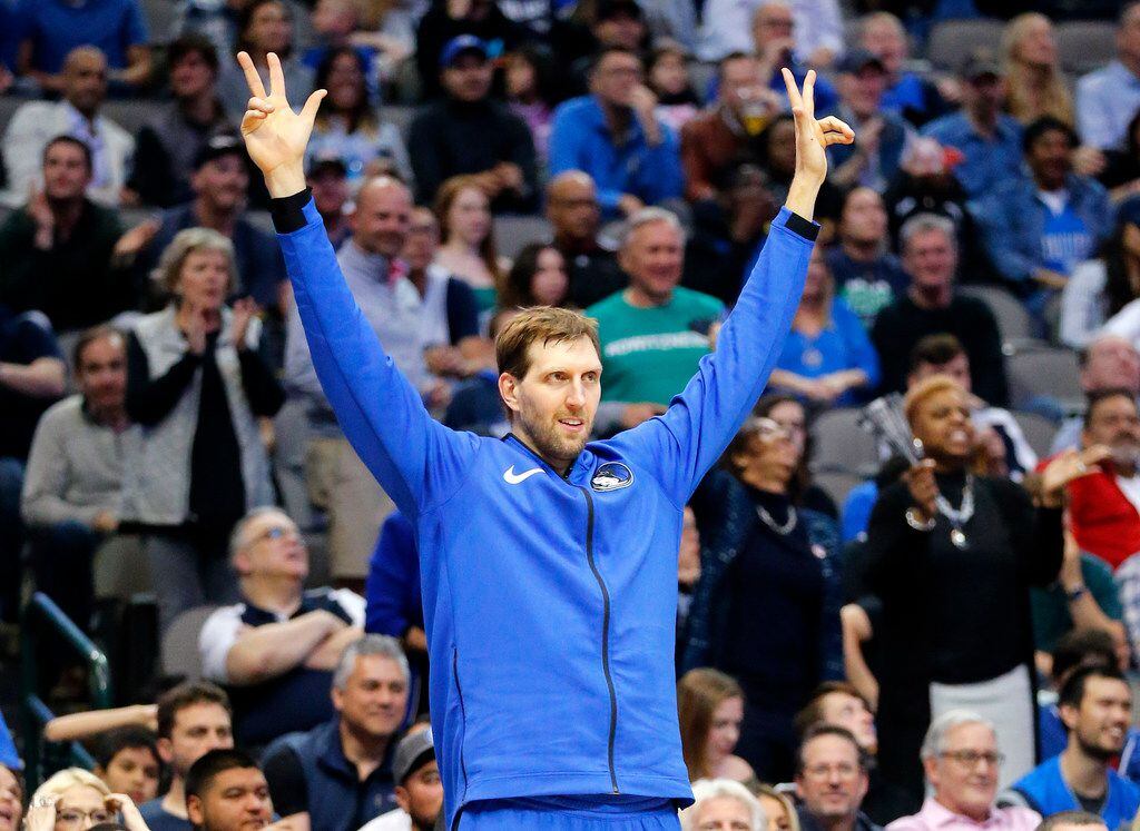 Dallas Mavericks forward Dirk Nowitzki (41) reacts after Luka Doncic hit the go-ahead...
