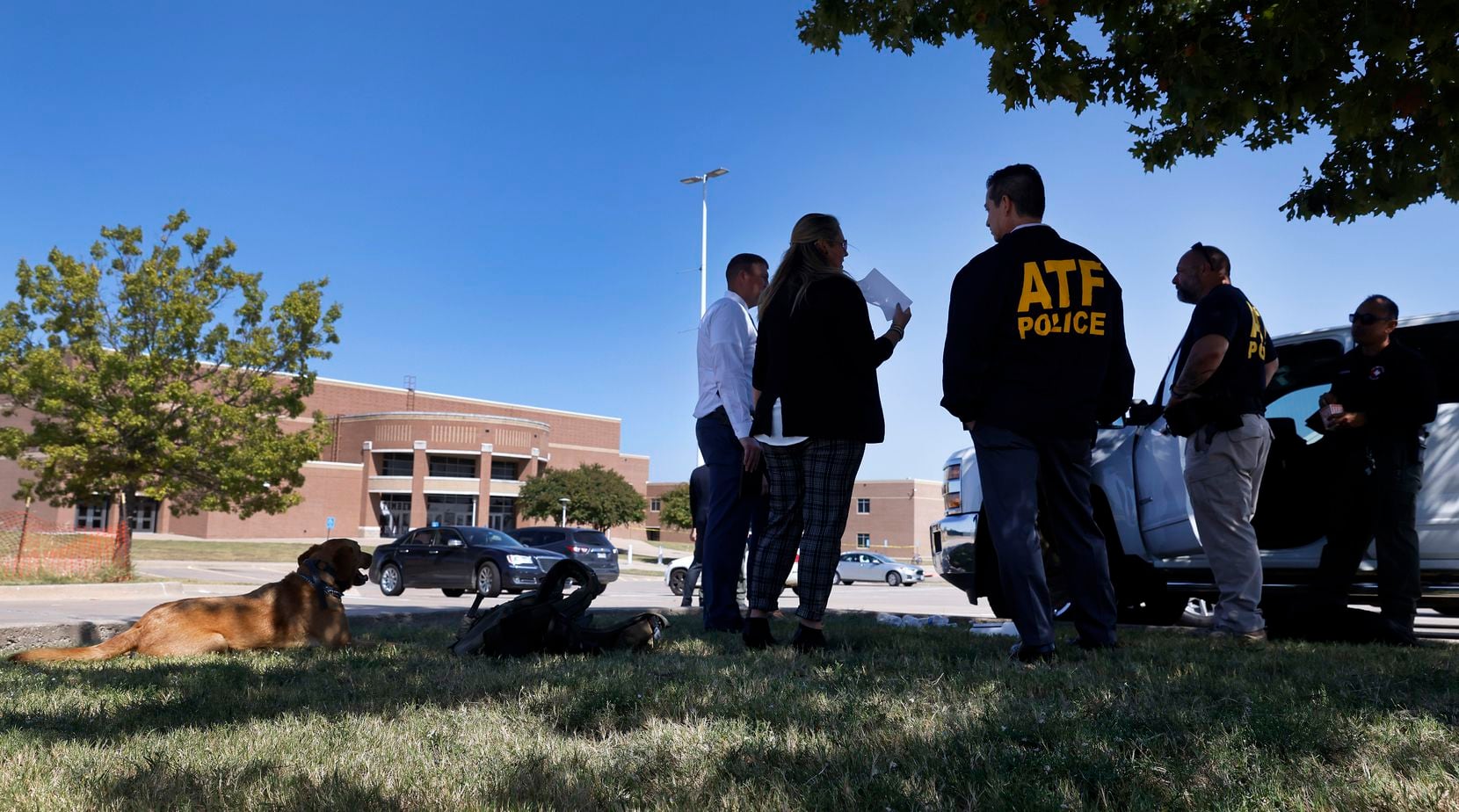 ATF officials gather in front of Mansfield Timberview High School in Arlington, Texas...