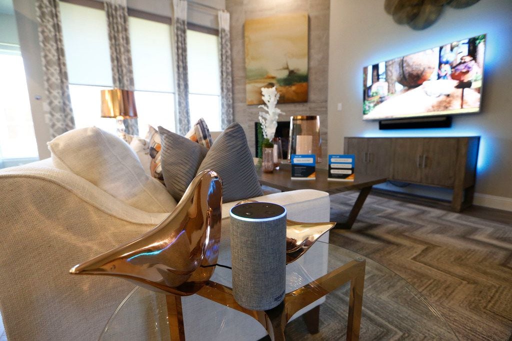 An Amazon Echo controls the blinds and television lighting at an Amazon Experience Centers...
