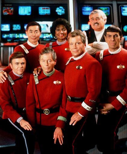 Front row, from left: Walter Koenig as Chekov, DeForest Kelley as Dr. McCoy, William Shatner...