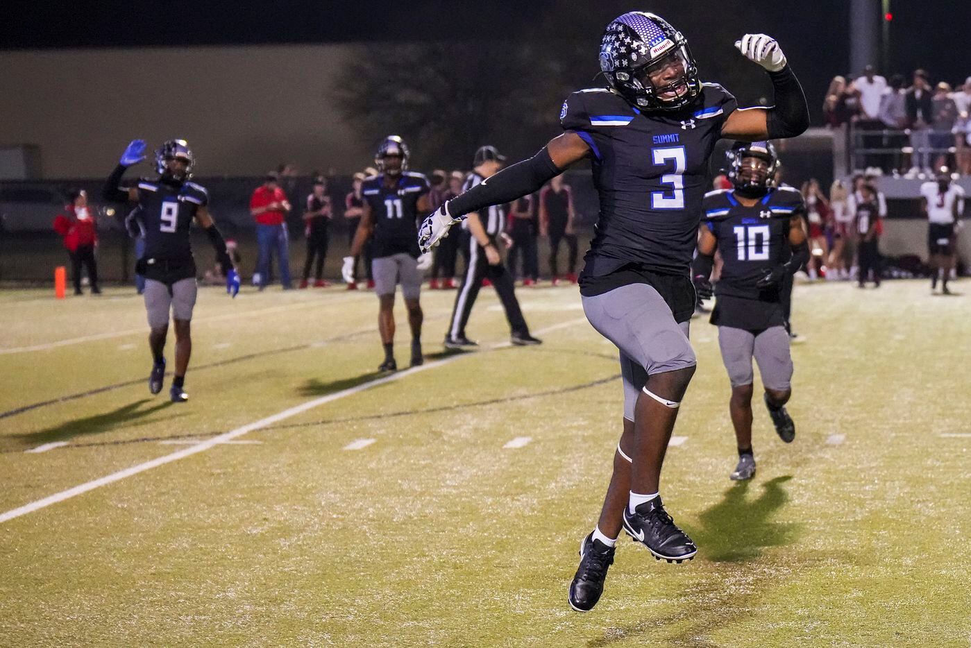 Mansfield Summit defensive back Ahmaad Moses (3) celebrates after intercepting a Colleyville Heritage pass during the second half of the Class 5A Division I Region I final on Friday, Dec. 3, 2021, in North Richland Hills, Texas. (Smiley N. Pool/The Dallas Morning News)