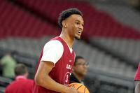 Alabama guard Rylan Griffen practices ahead of a Final Four college basketball game in the...
