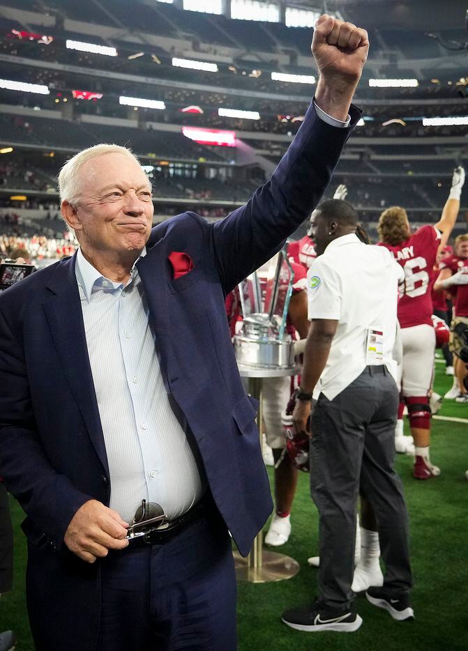 Dallas Cowboys owner and general manager Jerry Jones celebrates after Arkansas defeated...