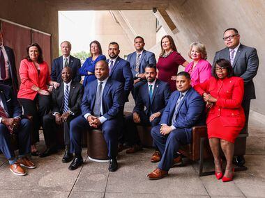 Recently elected Dallas City Council members pose together with Mayor Eric Johnson at the...