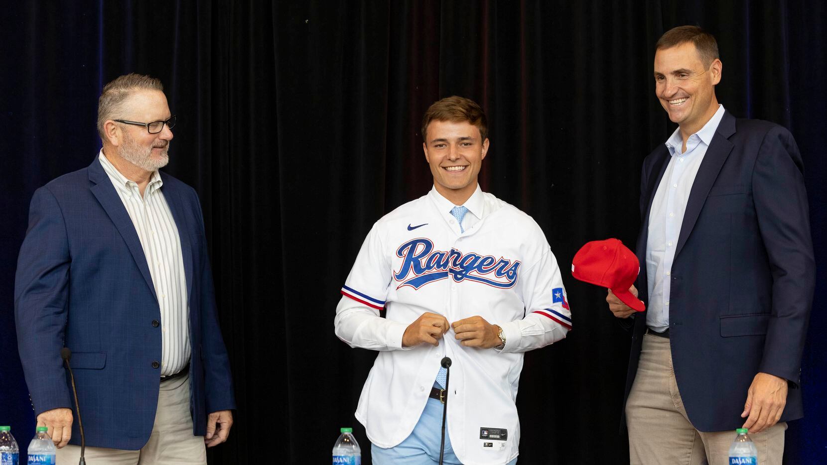Kip Fagg (left), Texas Rangers Senior Director of Amateur Scouting, and Chris Young (right),...