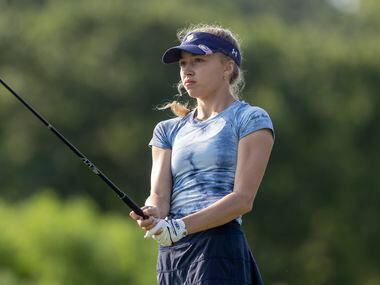Highland Park’s Grace Heiss hits from the 3rd tee box during the 5A girls state golf...