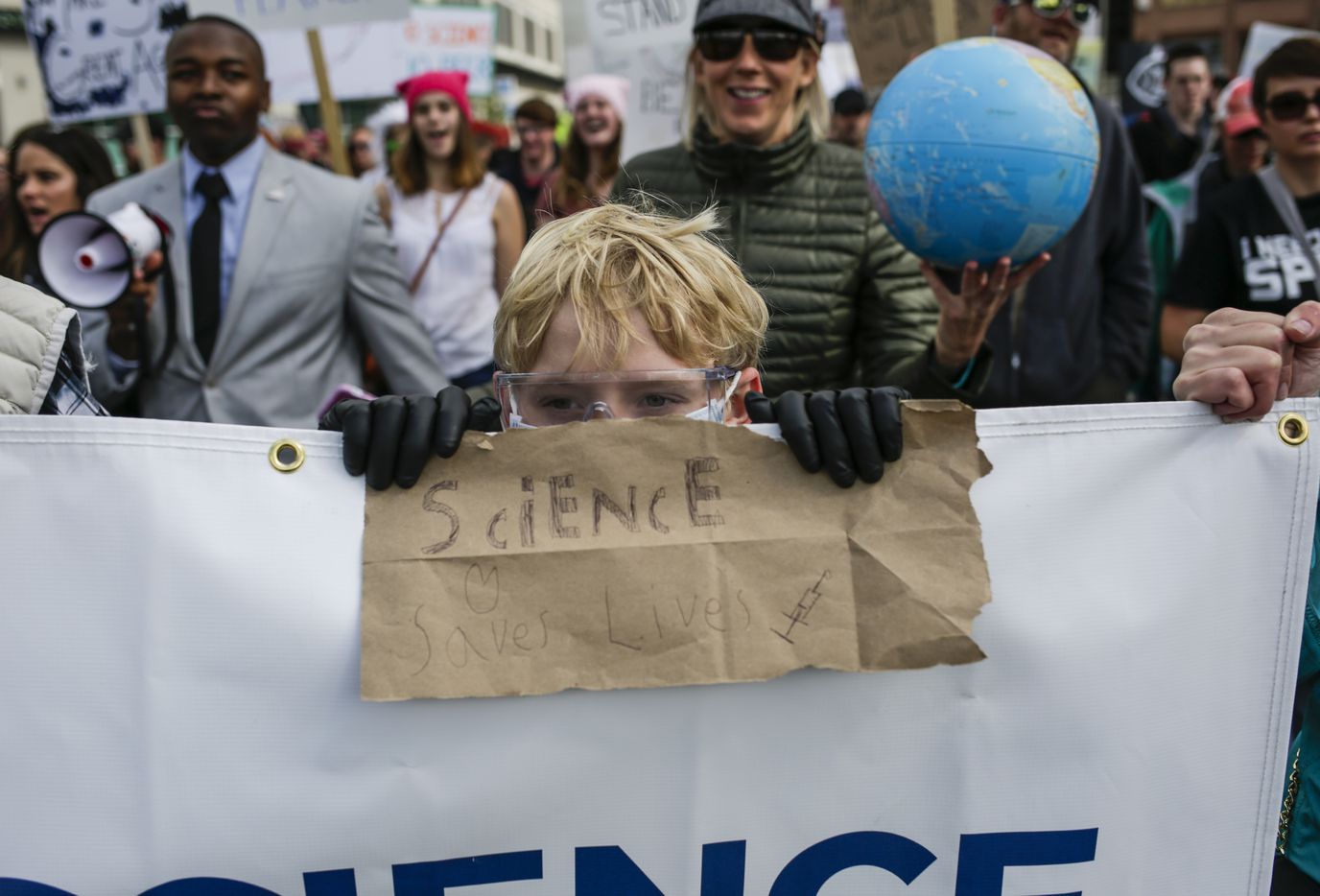 Dylan Sawyer, 12, of Boulder, Colo., during the March for Science in Denver, April 22, 2017....