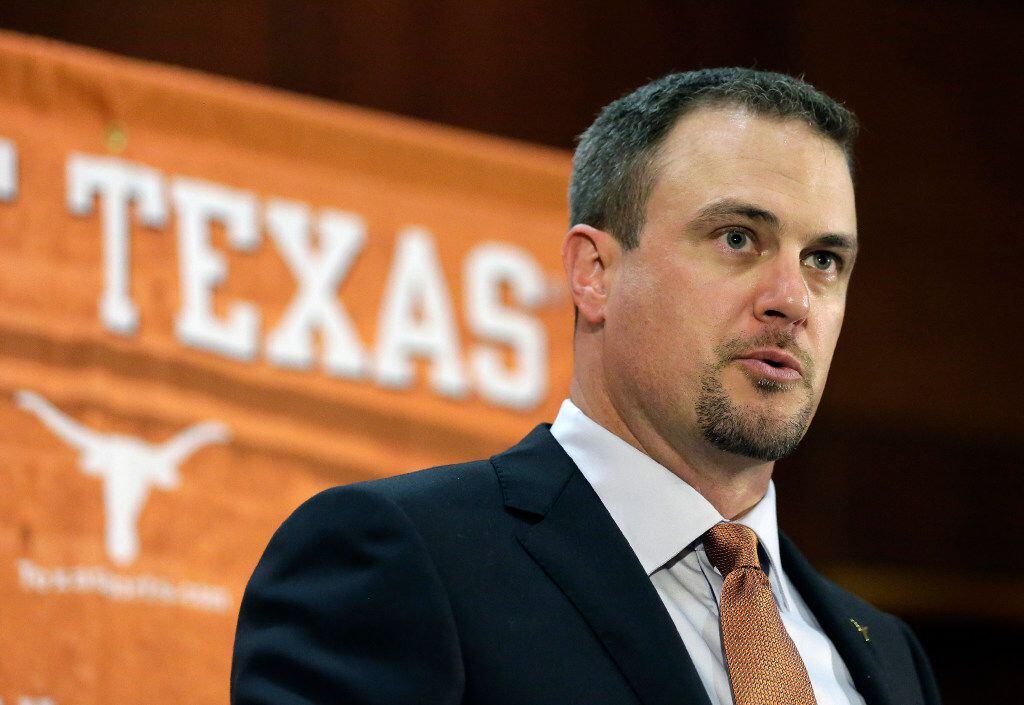 FILE - In this Nov. 27, 2016, file photo, Tom Herman talks to the media during a news...