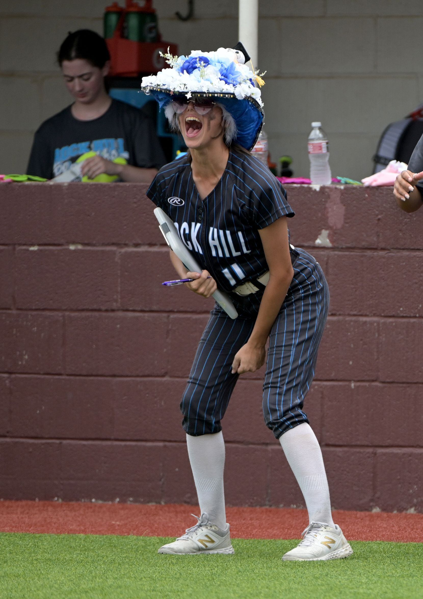 Prosper Rock Hill's Payton Hansen (11) celebrates after a play during game 3 of a Class 5A...
