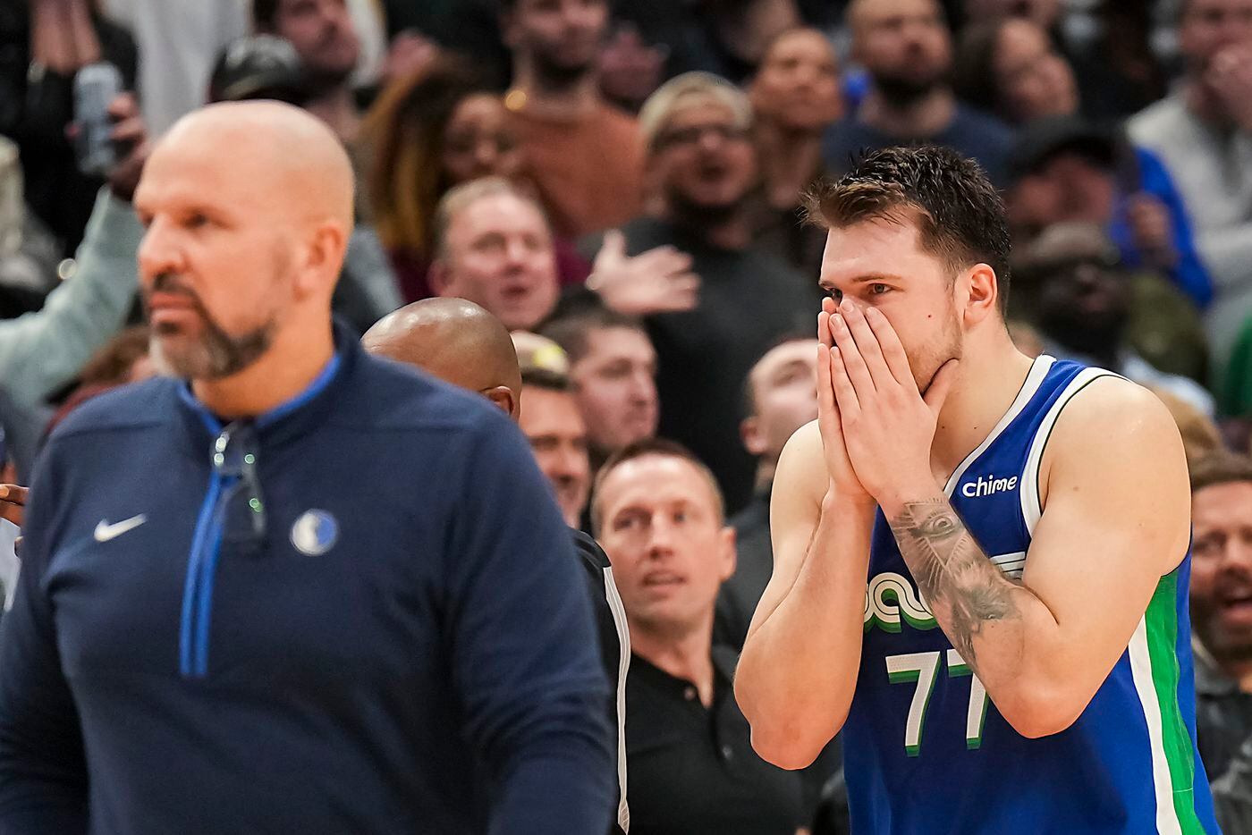 Dallas Mavericks guard Luka Doncic (77) reacts after being called for a foul sending...