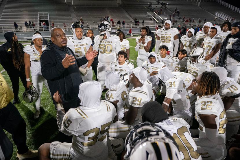 South Oak Cliff coach Jason Todd speaks to his team after a 38-10 victory over Woodrow...