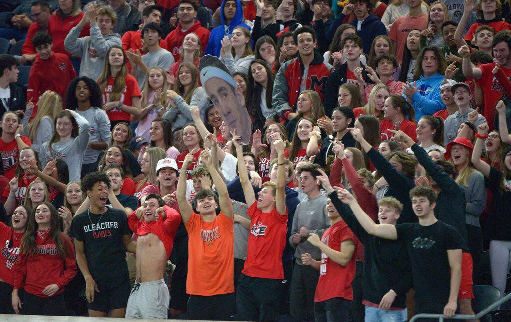 Flower Mound Marcus' students cheer in the second half of a Class 6A Division II area round...