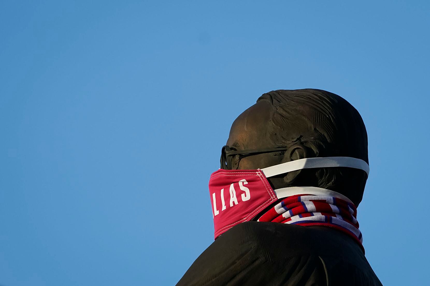 The Lamar Hunt statue wears a face mask before an MLS soccer game between FC Dallas the Nashville SC at Toyota Stadium on Wednesday, Aug. 12, 2020, in Frisco, Texas. (Smiley N. Pool/The Dallas Morning News)