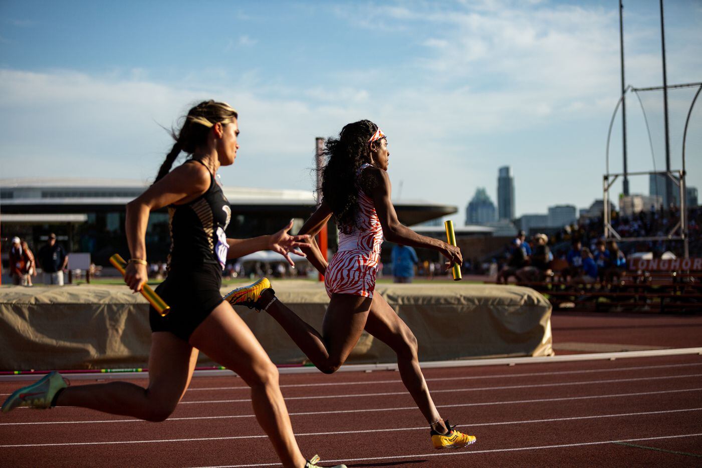Lancaster’s Trelondra Strong, right, runs in the girls’ 4x200 relay final at the UIL Track &...