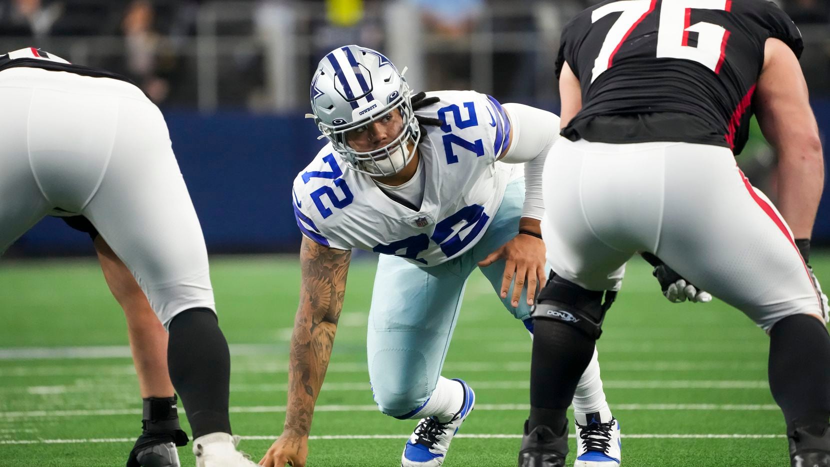 Dallas Cowboys defensive tackle Trysten Hill (72) lines up against Atlanta Falcons offensive tackle Kaleb McGary (76) during the first half of an NFL football game at AT&T Stadium on Sunday, Nov. 14, 2021, in Arlington.