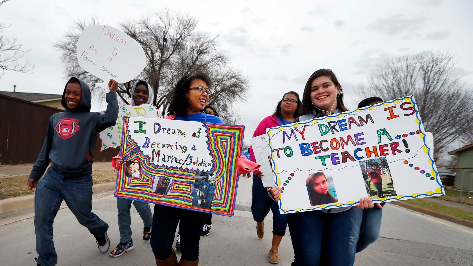 Kids from Mount Moriah Missionary Baptist Church carry signs of their dreams in the 27th Annual MLK Parade and March sponsored by the NAACP Garland Unit in Garland, on Saturday, January 16, 2016.