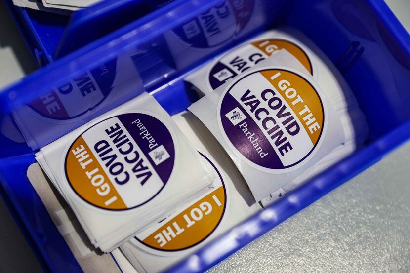 COVID vaccine stickers where the Pfizer-BioNTech COVID-19 vaccine is administered at Ellis...