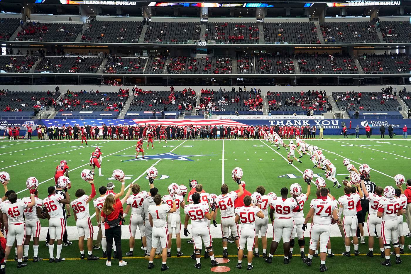 Katy kicker Nemanja Lazic (17) approaches the ball for the opening kickoff of the Class 6A Division II state football championship game against Cedar Hill at AT&T Stadium on Saturday, Jan. 16, 2021, in Arlington, Texas.