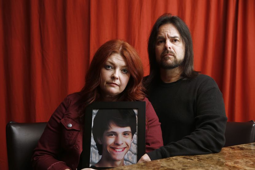 Melanie and Steve Uriegas, with a photo of their son, Jesse, who died by suicide last...
