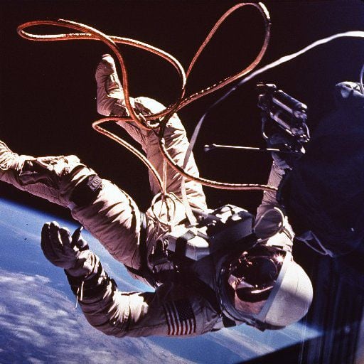 Astronaut Ed White moves away from the Gemini 4 capsule in this 1965 file photo. 
