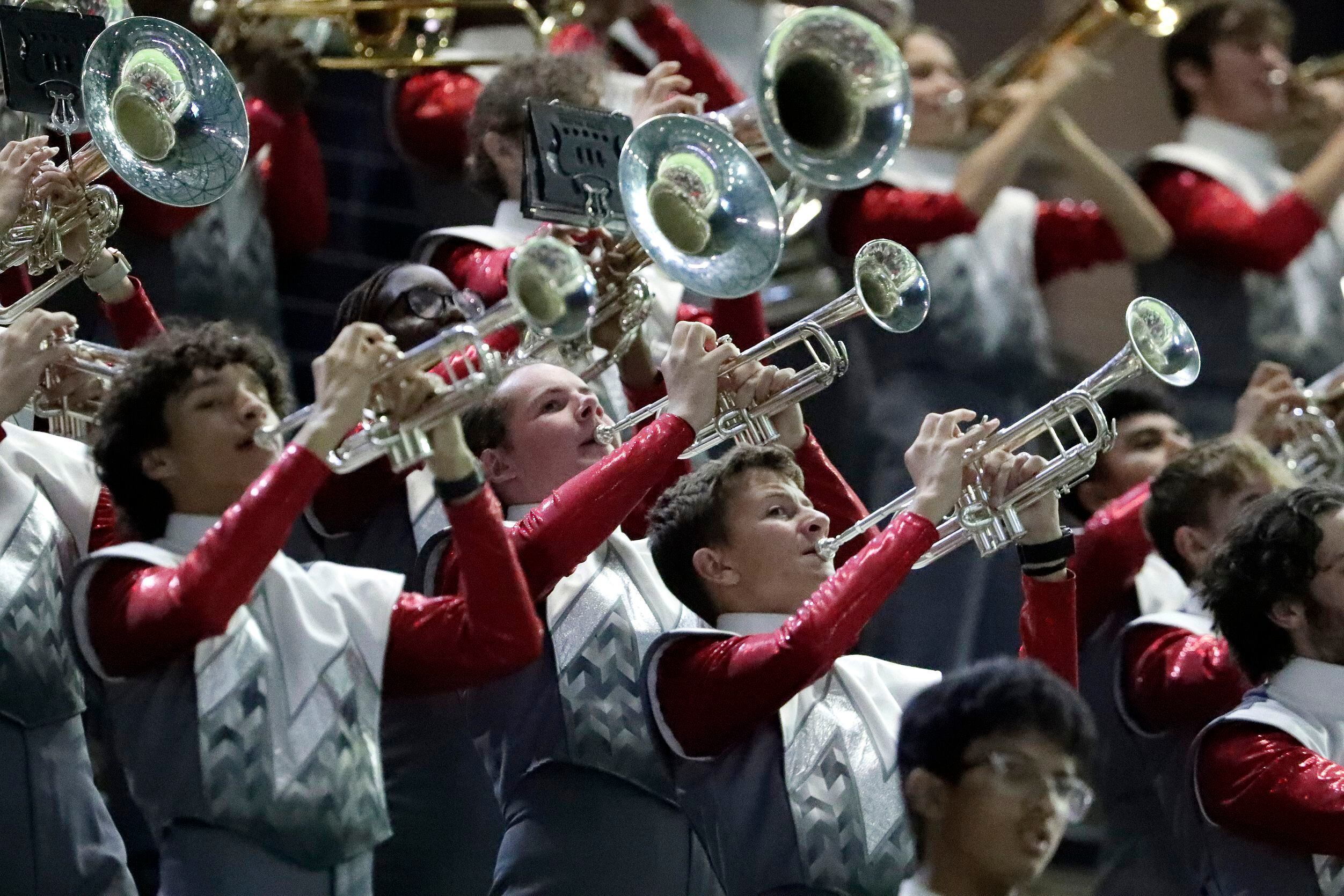 The Melissa High School band performs during the first half as Melissa High School hosted...