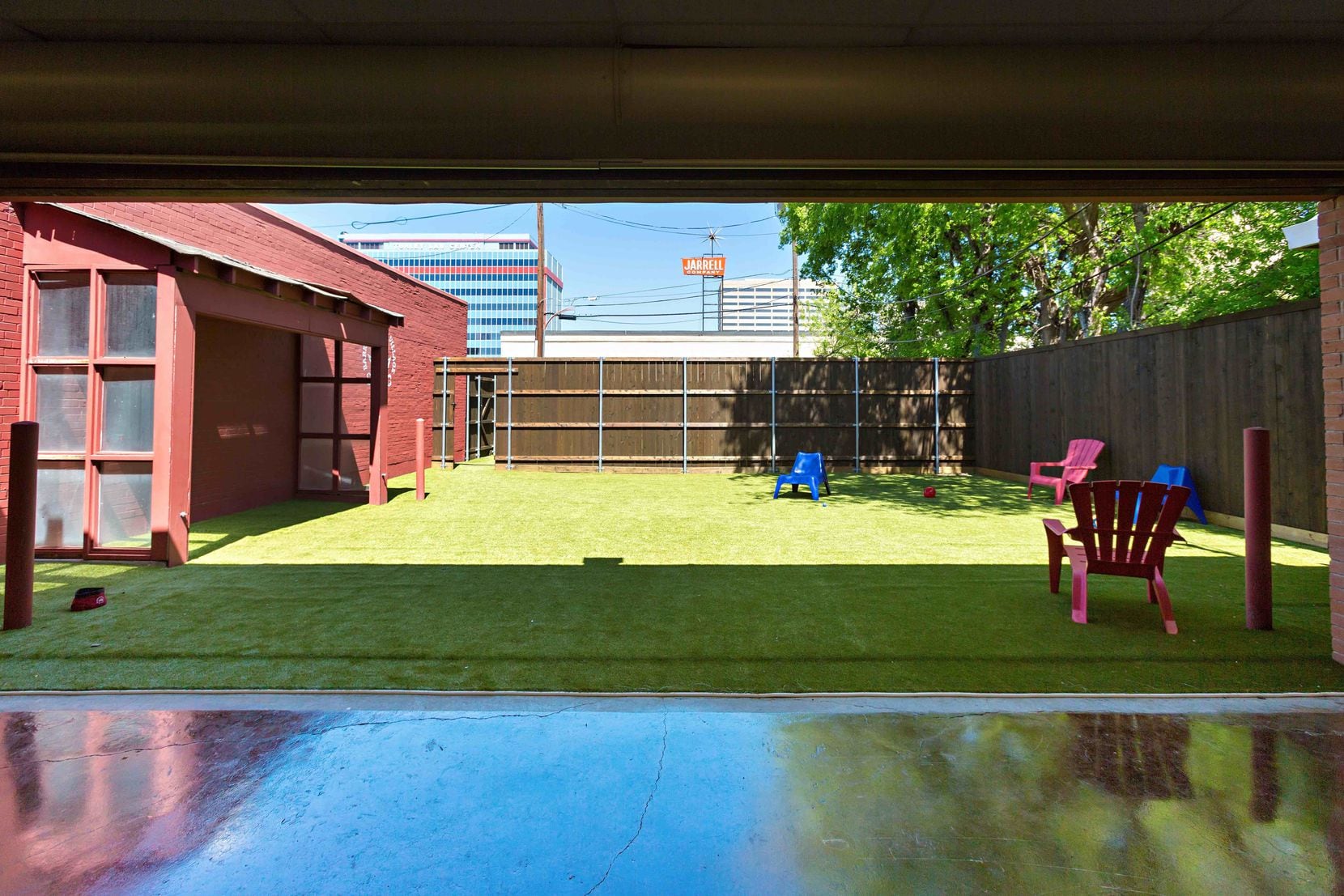 You can check out the playroom yard at Barking Hound Village during a yappy hour Thursday.