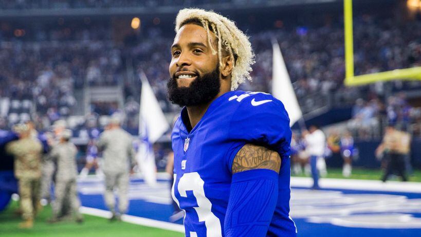 New York Giants wide receiver Odell Beckham (13) walks on the sideline before an NFL game...