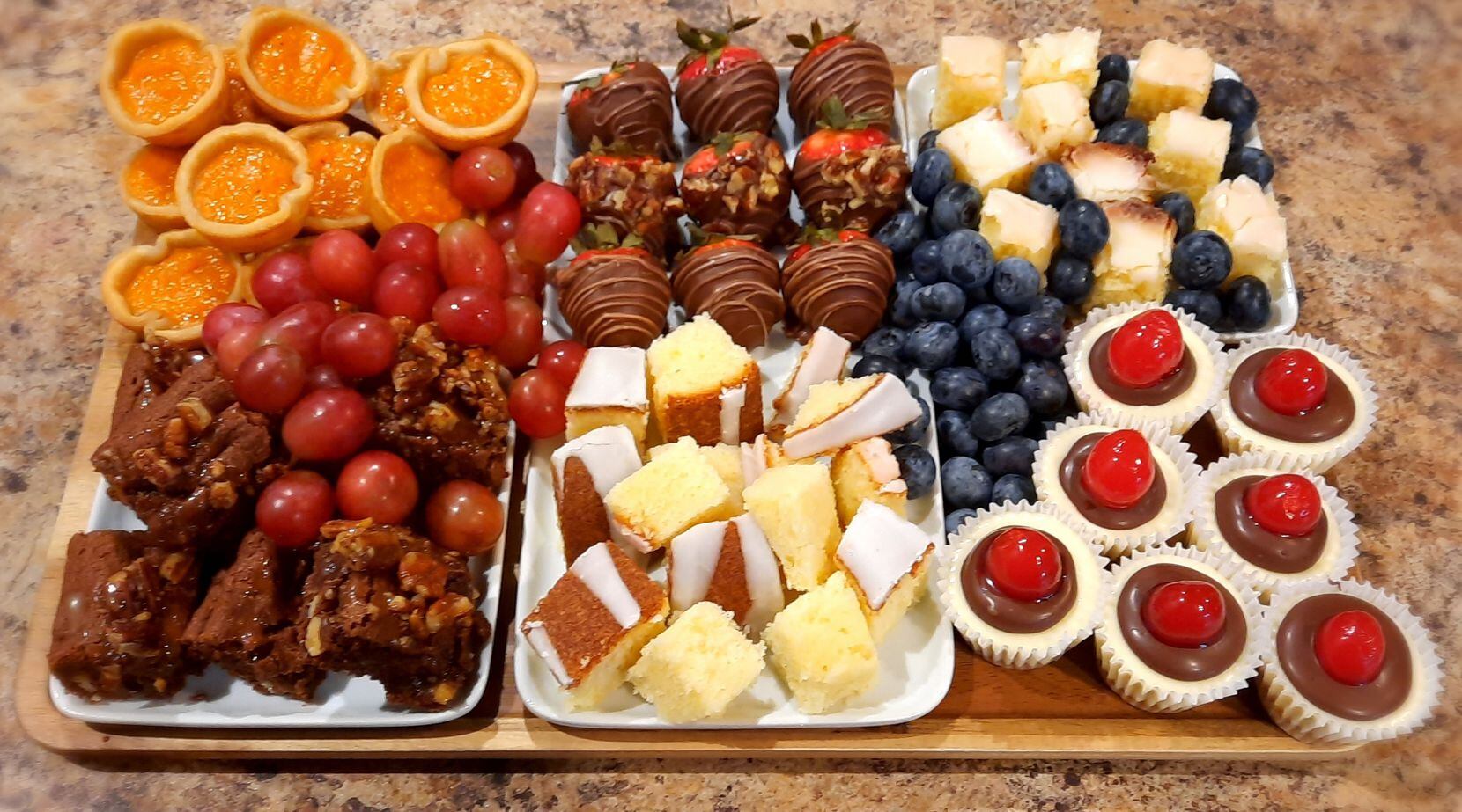 A dessert charcuterie board from 2 Sisters Sweet Creations. Sisters Yolanda Beldsoe and...