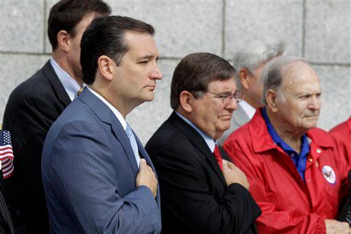  Sen. Ted Cruz, R-Texas, left, and Rep. Michael Burgess, R-Lewisville, visit with Texas...
