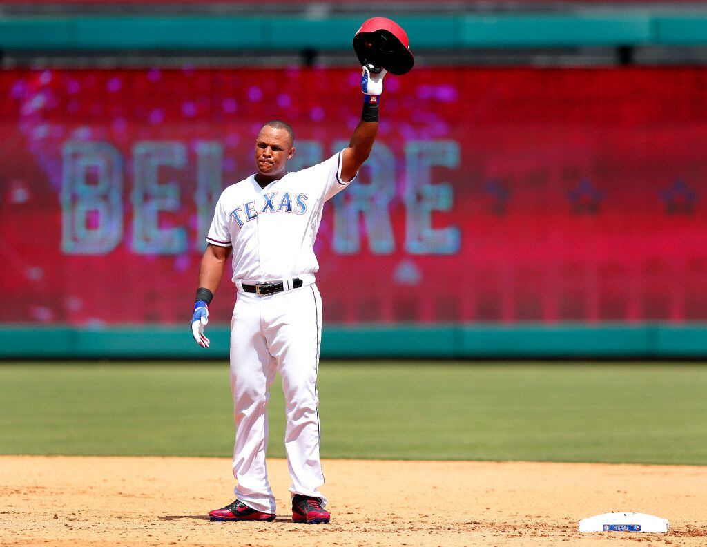 Texas Rangers Adrian Beltre (29) waves to crowd after achieving his 3,000th career hit in...