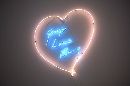 "George Loves Kenny" is a neon work by British contemporary artist Tracey Emin for Dallas art collector Kenny Goss and his partner, pop-star George Michael